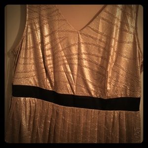 Gold with a black trimmed belted dress